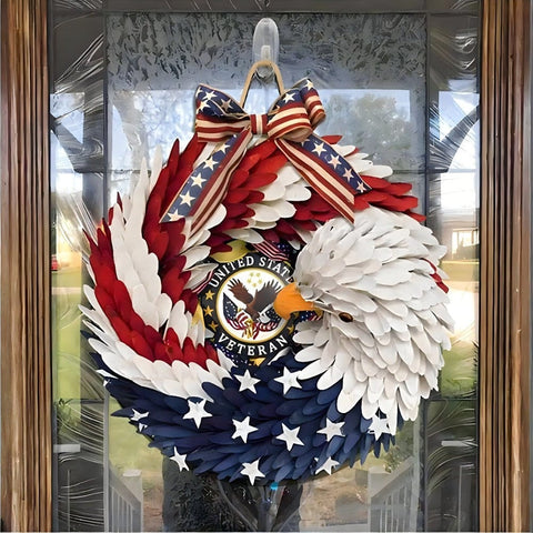 American Eagle Wreath made from a DIY kit hanging on front door with glass behind it